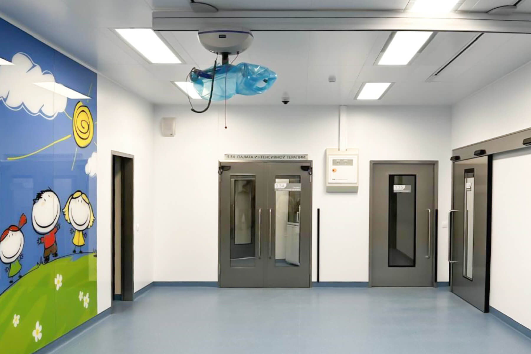 children unit in a hospital with automatic hinged doors and patient lift